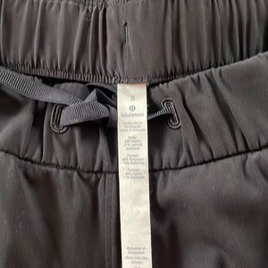 Size 8 lululemon black pants with drawstring waist ankle length